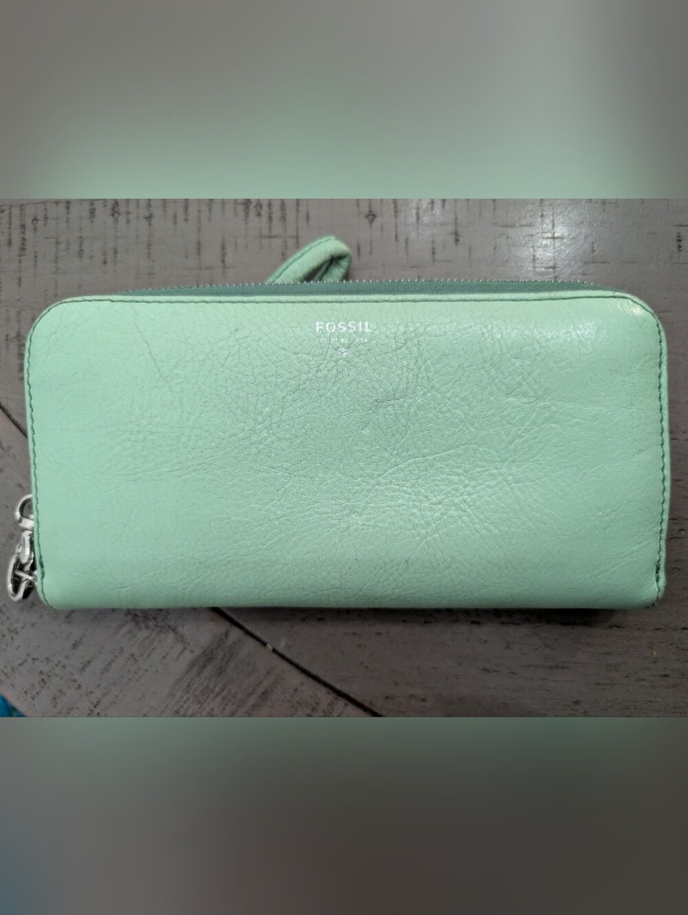 mint green Fossil pebbled leather zip-around wallet